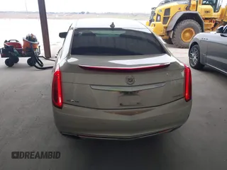 2015 Cadillac XTS Luxury z VIN 2G61M5S39F9246298, wystawiony jako IAAI lot #41555093 z przebiegiem 126 928 mil mil oraz . Historia ofert i sprzedaży dostępna na DreamBid. Obrazek 16.