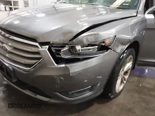 2013 Ford Taurus SEL with VIN 1FAHP2E86DG177504, listed as a IAAI auction lot 42071852 with 130,547 mi miles and . Bid and sale history available at carsss.com. Image 6.