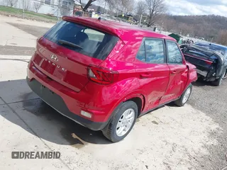 2023 Hyundai Venue SE with VIN KMHRB8A30PU227454, listed as a IAAI auction lot 41863384 with 23,464 mi miles and . Bid and sale history available at DreamBid. Image 4.