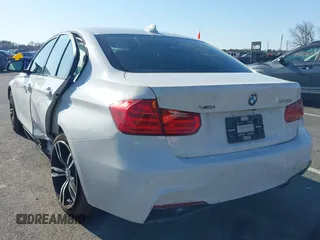 2014 BMW 3 Series 328i xDrive with VIN WBA3B3G51ENR81909, listed as a IAAI auction lot 41990108 with 83,051 mi miles. Bid and sale history available at carsss.com. Image 3.