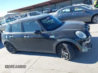 2015 MINI Hardtop 4 Door S with VIN WMWXU3C53F2B56459, listed as a IAAI auction lot 41400624 with 233,850 mi miles and . Bid and sale history available at DreamBid. Image 13.