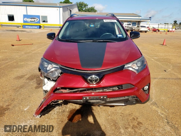 2018 Toyota RAV4 XLE with VIN 2T3RFREV7JW818661, listed as a Copart auction lot 65756615 with 56,369 mi miles and Salvage title. Bid and sale history available at DreamBid. Image 5.