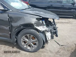 2014 Hyundai Santa Fe with VIN 5XYZUDLB6EG213889, listed as a IAAI auction lot 42036202 with 188,247 mi miles and . Bid and sale history available at DreamBid. Image 18.