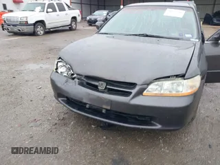 1999 Honda Accord LX with VIN 1HGCG5647XA154131, listed as a IAAI auction lot 41962701 with 126,673 mi miles and . Bid and sale history available at DreamBid. Image 6.