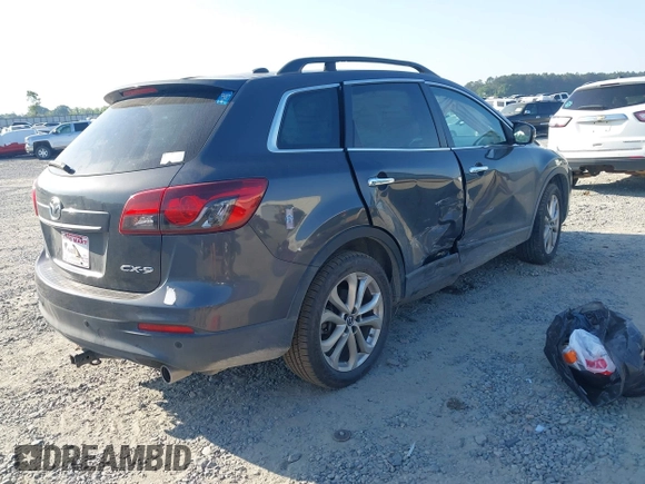 2013 Mazda CX-9 Grand Touring z VIN JM3TB2DA6D0424124, wystawiony jako IAAI lot #42032588 z przebiegiem 151 569 mil mil oraz . Historia ofert i sprzedaży dostępna na DreamBid. Obrazek 4.