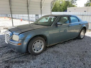 2005 Chrysler 300 Touring z VIN 2C3JA53G65H574021, wystawiony jako Copart lot #70073414 z przebiegiem 291 219 mil mil oraz Szkoda całkowita • Salvage title. Historia ofert i sprzedaży dostępna na DreamBid. Obrazek 1.