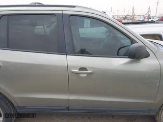 2009 Hyundai Santa Fe SE with VIN 5NMSH13E39H297907, listed as a IAAI auction lot 41708199 with 203,771 mi miles. Bid and sale history available at carsss.com. Image 13.