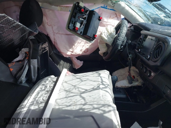 2021 Toyota Tacoma SR with VIN 3TYRX5GN6MT031018, listed as a IAAI auction lot 42276988 with Not provided miles and . Bid and sale history available at DreamBid. Image 5.