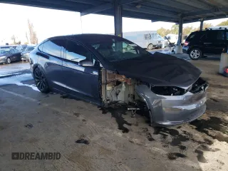 2023 Tesla Model X with VIN 7SAXCDE55PF410146, listed as a Copart auction lot 48818085 with 26,494 mi miles and Salvage Title. Bid and sale history available at DreamBid. Image 4.