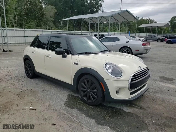 2021 MINI Hardtop 4 Door Oxford Edition with VIN WMWXU7C07M2N06066, listed as a Copart auction lot 68949904 with 56,378 mi miles and Salvage Title. Bid and sale history available at carsss.com. Image 10.