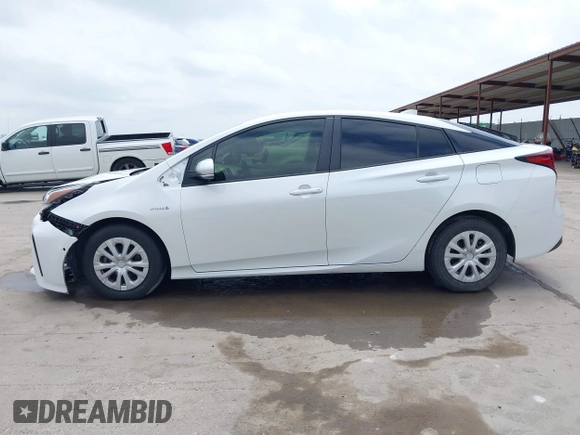 2022 Toyota Prius L Eco with VIN JTDKAMFUXN3157225, listed as a IAAI auction lot 39292379 with 59,333 mi miles and . Bid and sale history available at DreamBid. Image 15.
