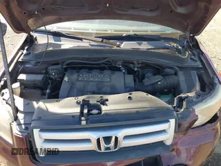 2007 Honda Pilot EX-L with VIN 5FNYF18547B006094, listed as a IAAI auction lot 42297719 with 235,632 mi miles and . Bid and sale history available at DreamBid. Image 10.