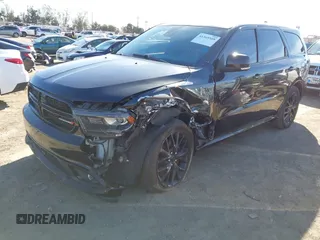 2015 Dodge Durango R/T with VIN 1C4SDHCT5FC937676, listed as a IAAI auction lot 41369508 with 107,075 mi miles and . Bid and sale history available at DreamBid. Image 20.