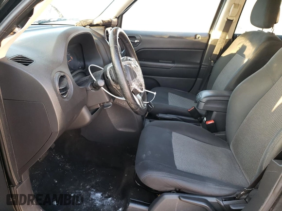 2014 Jeep Patriot Latitude with VIN 1C4NJPFB9ED531783, listed as a Copart auction lot 87758345 with 138,237 mi miles and Salvage Title. Bid and sale history available at carsss.com. Image 7.