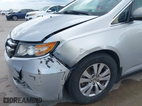 2014 Honda Odyssey EX-L with VIN 5FNRL5H60EB058753, listed as a IAAI auction lot 42595221 with 194,995 mi miles and . Bid and sale history available at DreamBid. Image 19.