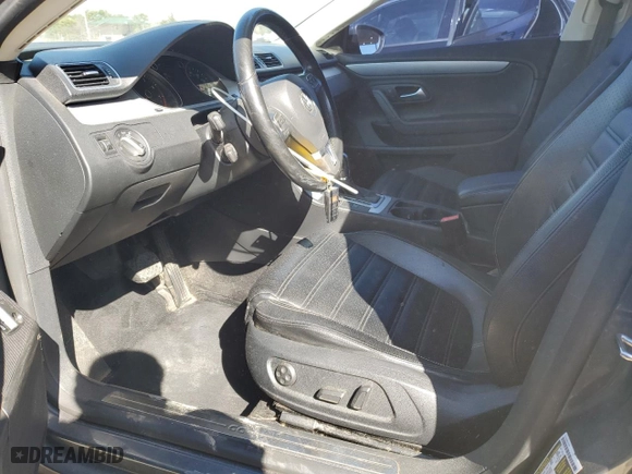 2014 Volkswagen CC Sport with VIN WVWBP7AN4EE529968, listed as a Copart auction lot 48395715 with 152,064 mi miles and Salvage Title. Bid and sale history available at carsss.com. Image 7.