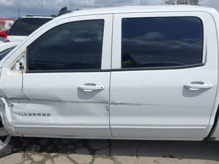 2016 Chevrolet Silverado 1500 LT with VIN 1GCUKREC1GF145767, listed as a IAAI auction lot 41869630 with 133,407 mi miles and . Bid and sale history available at DreamBid. Image 14.