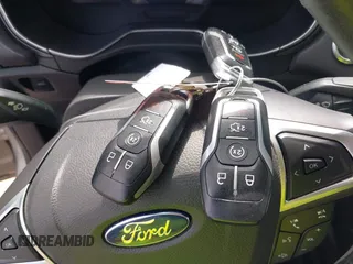 2015 Ford Fusion Energi Titanium with VIN 3FA6P0SU3FR114739, listed as a IAAI auction lot 42003011 with 120,553 mi miles. Bid and sale history available at carsss.com. Image 11.