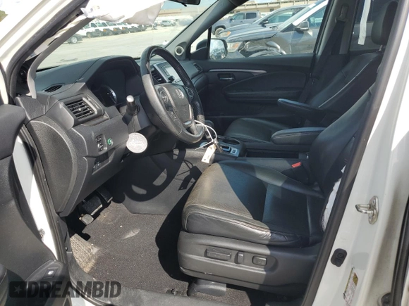 2017 Honda Ridgeline RTL with VIN 5FPYK2F53HB001434, listed as a Copart auction lot 58414335 with 187,711 mi miles and Salvage title. Bid and sale history available at DreamBid. Image 7.