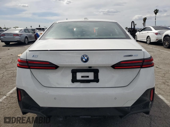 2024 BMW i5 eDrive40 with VIN WBY33FK04RCR92576, listed as a Copart auction lot 51180875 with 11,289 mi miles and Salvage title. Bid and sale history available at DreamBid. Image 6.