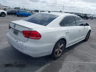 2013 Volkswagen Passat SE with VIN 1VWBP7A30DC056737, listed as a IAAI auction lot 42254753 with 160,732 mi miles and . Bid and sale history available at DreamBid. Image 4.