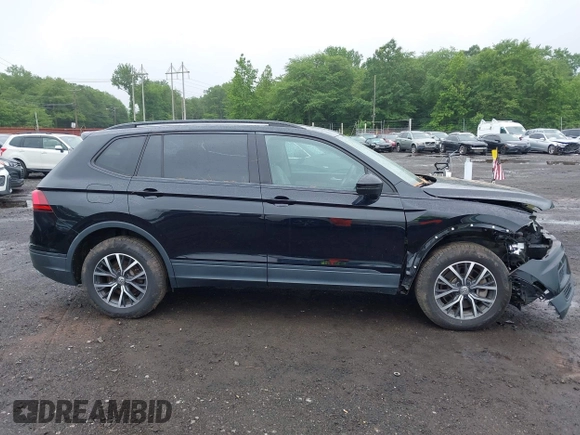 2021 Volkswagen Tiguan S z VIN 3VV0B7AX3MM031908, wystawiony jako IAAI lot #42504384 z przebiegiem 42 510 mil mil oraz . Historia ofert i sprzedaży dostępna na DreamBid. Obrazek 13.