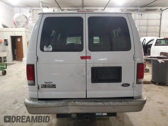 1999 Ford Econoline Passenger XL with VIN 1FBSS31L6XHA03014, listed as a Copart auction lot 88912295 with 107,472 mi miles and Salvage title. Bid and sale history available at DreamBid. Image 6.