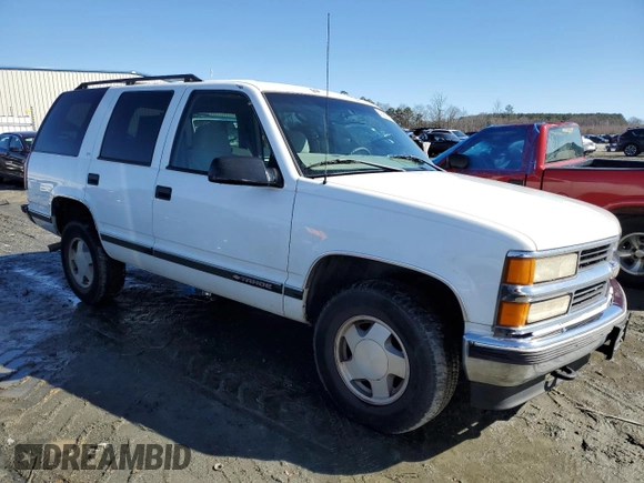1998 Chevrolet Tahoe z VIN 1GNEK13R8WJ372101, wystawiony jako Copart lot #42957075 z przebiegiem 174 853 mil mil oraz Szkoda całkowita • Salvage title. Historia ofert i sprzedaży dostępna na DreamBid. Obrazek 4.