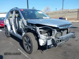 2018 Subaru Forester Limited with VIN JF2SJARC4JH435231, listed as a IAAI auction lot 42011028 with 51,901 mi miles. Bid and sale history available at carsss.com. Image 1.