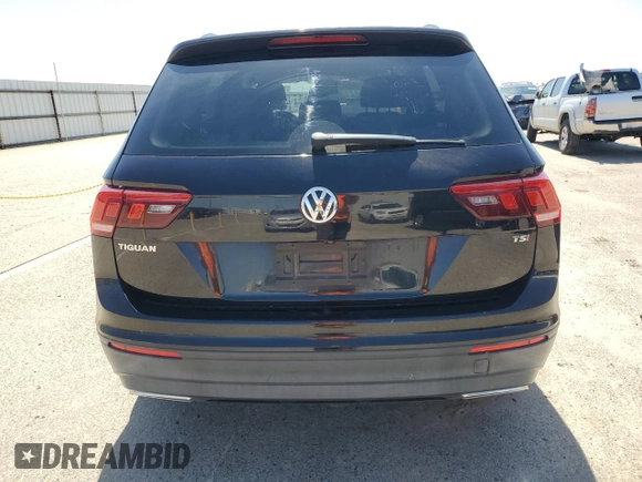 2018 Volkswagen Tiguan S with VIN 3VV1B7AXXJM069099, listed as a Copart auction lot 52345235 with 79,359 mi miles and Salvage title. Bid and sale history available at DreamBid. Image 6.