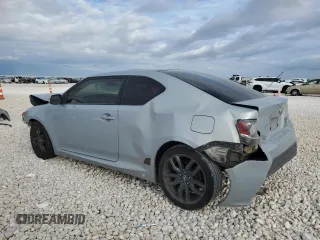 2014 Scion tC z VIN JTKJF5C79E3067932, wystawiony jako Copart lot #50425555 z przebiegiem Nie podano mil oraz Szkody całkowita. Historia ofert i sprzedaży dostępna na DreamBid. Obrazek 2.