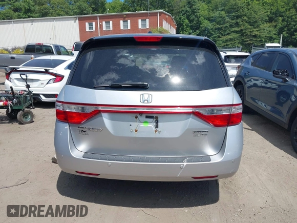 2012 Honda Odyssey Touring with VIN 5FNRL5H9XCB026741, listed as a IAAI auction lot 42808245 with 293,422 mi miles and . Bid and sale history available at DreamBid. Image 16.