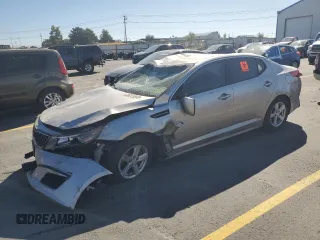 2015 Kia Optima LX z VIN KNAGM4A7XF5587578, wystawiony jako Copart lot #59221945 z przebiegiem Nie podano mil oraz Szkoda całkowita • Salvage title. Historia ofert i sprzedaży dostępna na DreamBid. Obrazek 1.