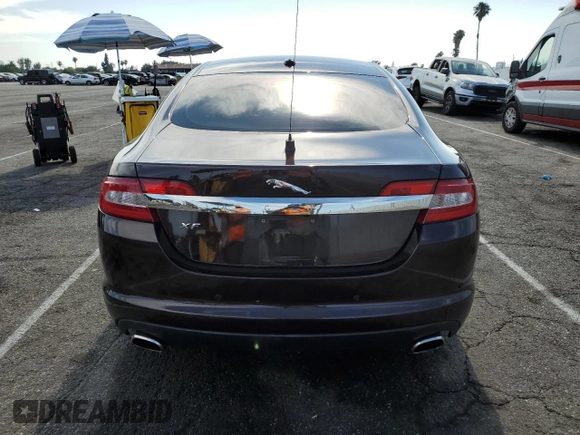 2011 Jaguar XF Premium with VIN SAJWA0GB1BLS08325, listed as a Copart auction lot 61190335 with 61,656 mi miles and Salvage title. Bid and sale history available at DreamBid. Image 6.