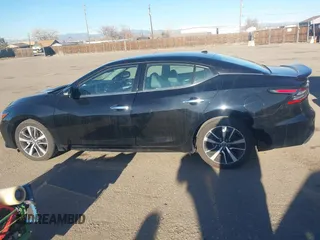 2021 Nissan Maxima SV z VIN 1N4AA6CV0MC512167, wystawiony jako IAAI lot #41692145 z przebiegiem 63 680 mil mil oraz . Historia ofert i sprzedaży dostępna na DreamBid. Obrazek 14.