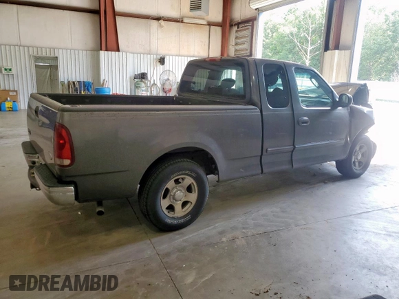2002 Ford F-150 XL with VIN 1FTRX17212NB63939, listed as a Copart auction lot 62728225 with Not provided miles and Salvage title. Bid and sale history available at DreamBid. Image 3.