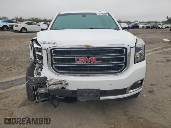 2015 GMC Yukon SLE with VIN 1GKS1AKC8FR733084, listed as a Copart auction lot 82960064 with 163,576 mi miles and Salvage Title. Bid and sale history available at carsss.com. Image 5.