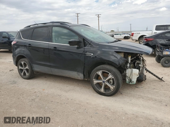 2017 Ford Escape SE with VIN 1FMCU9G93HUB66829, listed as a Copart auction lot 69093414 with 99,569 mi miles and Salvage Title. Bid and sale history available at carsss.com. Image 4.
