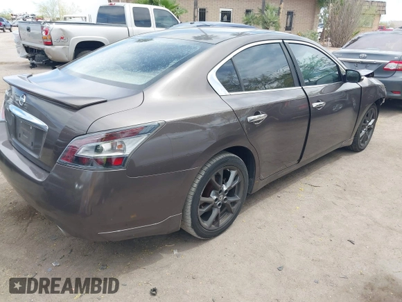 2014 Nissan Maxima S with VIN 1N4AA5AP0EC431251, listed as a IAAI auction lot 42120884 with 163,628 mi miles and . Bid and sale history available at DreamBid. Image 4.