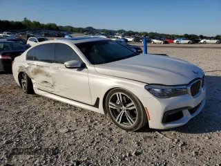 2019 BMW 7 Series 740i с VIN WBA7E2C51KB218262, выставлен на аукционе Copart как лот 52755095 с пробегом 55 082 миль миль и Списание • Salvage title. История ставок и продаж доступна на DreamBid. Изображение 4.