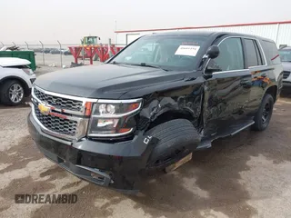 2018 Chevrolet Tahoe Commercial z VIN 1GNLCDEC0JR291831, wystawiony jako IAAI lot #40681194 z przebiegiem 111 711 mil mil oraz . Historia ofert i sprzedaży dostępna na DreamBid. Obrazek 2.