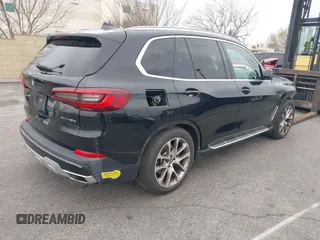 2022 BMW X5 xDrive45e with VIN 5UXTA6C08N9K85766, listed as a IAAI auction lot 41461039 with 95,003 mi miles. Bid and sale history available at carsss.com. Image 4.