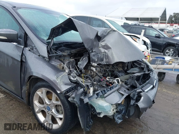 2013 Ford Focus Titanium with VIN 1FADP3J2XDL270393, listed as a IAAI auction lot 41814775 with 76,907 mi miles and . Bid and sale history available at carsss.com. Image 6.