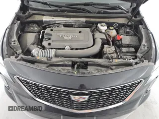 2023 Cadillac XT4 AWD Premium Luxury z VIN 1GYFZDR42PF174473, wystawiony jako Copart lot #55953305 z przebiegiem 42 268 mil mil oraz Szkoda całkowita • Salvage title. Historia ofert i sprzedaży dostępna na DreamBid. Obrazek 12.