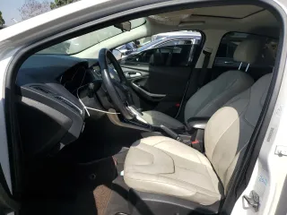 2017 Ford Focus Titanium with VIN 1FADP3J2XHL291606, listed as a Copart auction lot 58268285 with 153,272 mi miles and Salvage title. Bid and sale history available at DreamBid. Image 7.