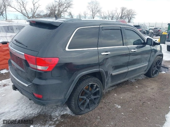 2012 Jeep Grand Cherokee Limited with VIN 1C4RJFBGXCC179054, listed as a IAAI auction lot 41729596 with 207,257 mi miles. Bid and sale history available at carsss.com. Image 4.