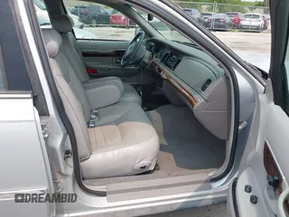 1999 Mercury Grand Marquis LS z VIN 2MEFM75W7XX659031, wystawiony jako IAAI lot #42362387 z przebiegiem 140 067 mil mil oraz . Historia ofert i sprzedaży dostępna na DreamBid. Obrazek 5.