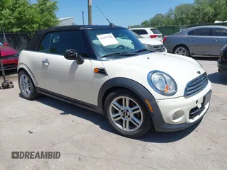 2012 MINI Convertible with VIN WMWZN3C51CT134646, listed as a IAAI auction lot 42252740 with 124,278 mi miles and . Bid and sale history available at DreamBid. Image 1.