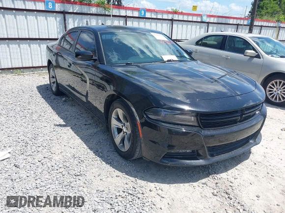2015 Dodge Charger SXT with VIN 2C3CDXHG2FH852208, listed as a IAAI auction lot 42120021 with 156,486 mi miles and . Bid and sale history available at DreamBid. Image 1.
