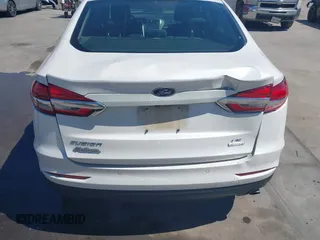 2019 Ford Fusion SE with VIN 3FA6P0HD0KR215531, listed as a IAAI auction lot 41867778 with 101,893 mi miles. Bid and sale history available at carsss.com. Image 6.